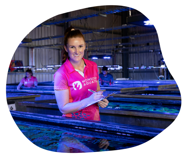 Lady at coral growing facility