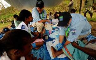 Medical staff treating patients