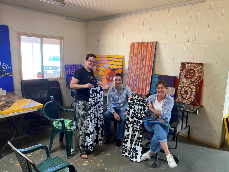 Australian consular officials decked out with Indigenous artist designs